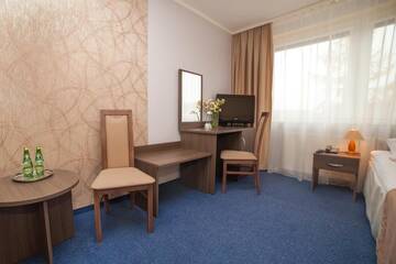 Фото номера Двухместный номер с 2 отдельными кроватями Отель Hotel IKAR г. Быдгощ 4