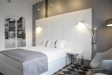 Фото номера Представительский номер с кроватью размера «king-size» Отель Holiday Inn Bydgoszcz г. Быдгощ 4