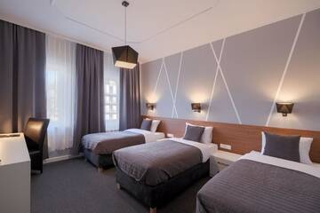 Фото номера Трехместный номер «Комфорт» Отель Park Hotel Bydgoszcz г. Быдгощ 3